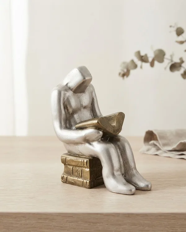 Escultura de Latón y Acero de Hombre Leyendo
