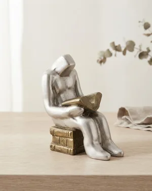 Escultura de Latón y Acero de Hombre Leyendo - miniatura 1
